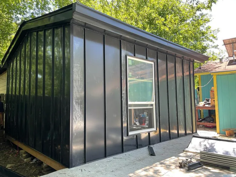 Black standing seam metal wall panels for Metal Roof Installation in Whitney