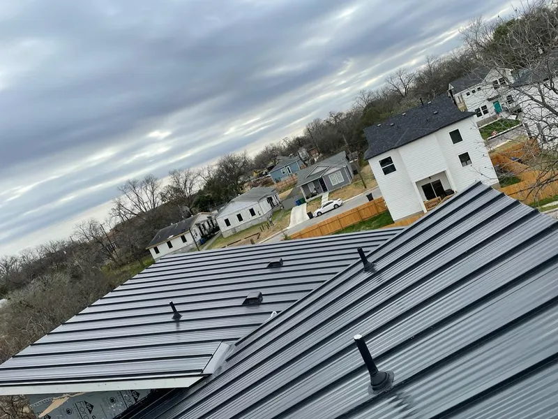 Standing seam metal roof panels with vents for Skylight Repair in Whitney